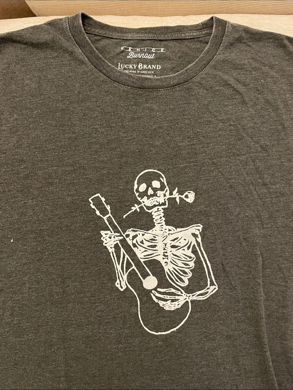 Lucky Brand Charcoal Men’s Short Sleeve Tee w/ White Skeleton Guitar Graphic